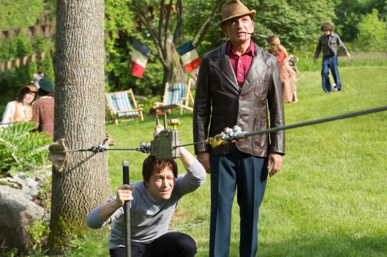 Papa Rudy (Sir Ben Kingsley, right) teaches Philippe Petit (Joseph Gordon-Levitt) how to use a cable tensioner in TriStar Pictures' THE WALK.
